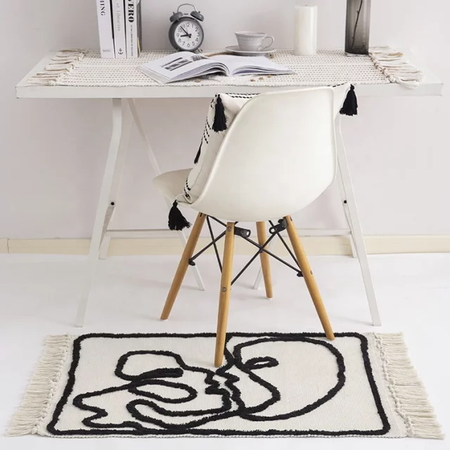 Abstract kissing faces rug