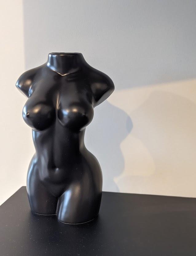 Female body ceramic vase in black